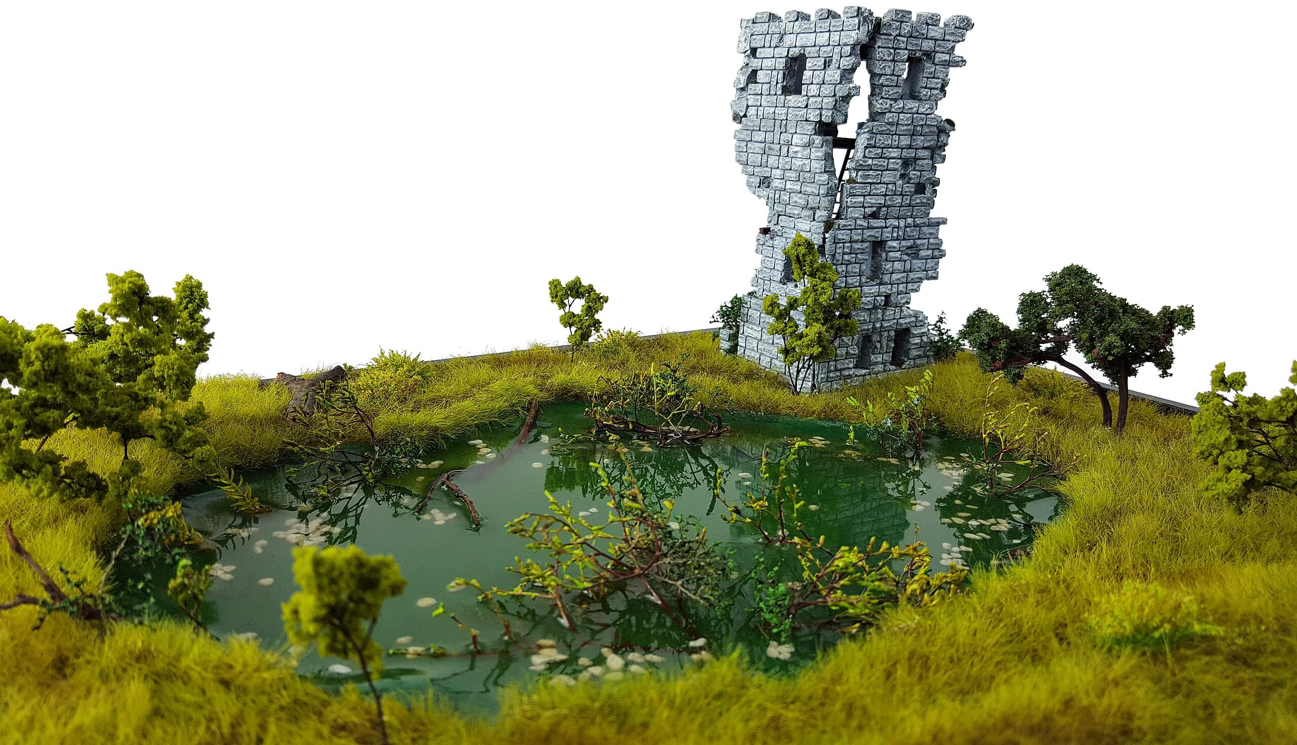 Diorama - landscape with green vegetation and tower ruin
